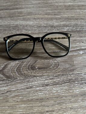 CHANEL Black Optical Frames with Gold Chain Temple Detail